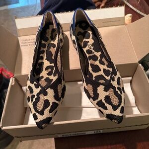 Rothy’s Point ballet flats in. Desert Cat pattern